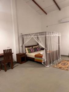 Postel nebo postele na pokoji v ubytování TEMBO Luxury Suites