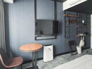 Kuchyň nebo kuchyňský kout v ubytování VESSEL INN NAMBA