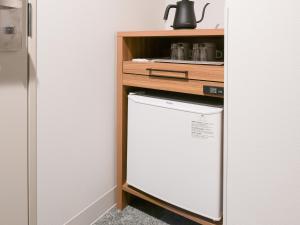 Kuchyň nebo kuchyňský kout v ubytování VESSEL INN NAMBA