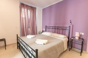 Letto o letti in una camera di Adam Eric