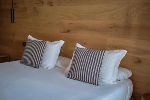 Postel nebo postele na pokoji v ubytování Las Gaviotas Suites Hotel & Spa