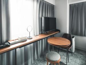 TV a/nebo společenská místnost v ubytování VESSEL INN NAMBA