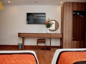 TV a/nebo společenská místnost v ubytování Bảo Châu Hotel Sapa - by Bay Luxury
