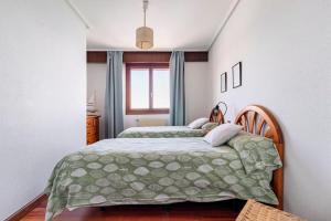 Postel nebo postele na pokoji v ubytování Precioso apartamento en la misma playa de Isla