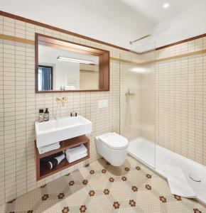 Ένα μπάνιο στο Engelwirt Apartments