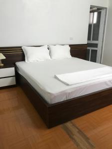 Posteľ alebo postele v izbe v ubytovaní Hải Lê Tam Coc Happy Homestay