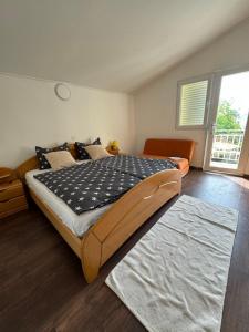 Postel nebo postele na pokoji v ubytování TRIBUNJ PRIVATE HOUSE