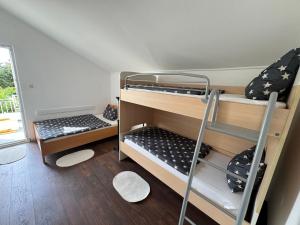 Postel nebo postele na pokoji v ubytování TRIBUNJ PRIVATE HOUSE