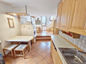 Kuchyň nebo kuchyňský kout v ubytování Chalet Stella by AMA Val di Fassa