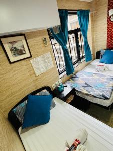 an overhead view of a room with two beds at Philippine Hostel in Hong Kong