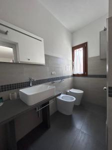 Koupelna v ubytování Longevity Hotel