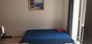 Postel nebo postele na pokoji v ubytování maison"la cigale du sud"