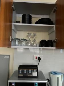 Dapur atau dapur kecil di The comfortplace Nakuru cbd