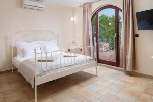 Posteľ alebo postele v izbe v ubytovaní Family Villa Tiffany&more