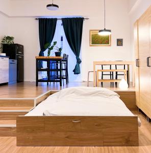 Postel nebo postele na pokoji v ubytování Aumetz square apartment