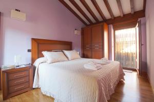 Un pat sau paturi într-o cameră la Casa Yito