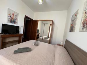Postel nebo postele na pokoji v ubytování Petronia Home