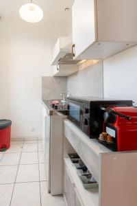 Kuchyň nebo kuchyňský kout v ubytování Appartement cosy pas loin de la gare St Charles