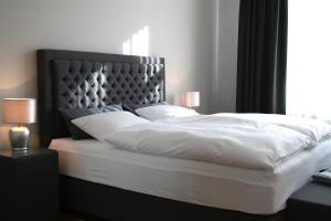 Postel nebo postele na pokoji v ubytování Ferienwohnung am Brühl