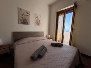 Postel nebo postele na pokoji v ubytování Petronia Home