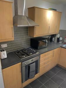 Köök või kööginurk majutusasutuses 3 bed, 2 bedroom city centre apt Glasgow