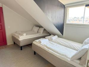 Posteľ alebo postele v izbe v ubytovaní Private rooftop apartment with sauna in the city centre