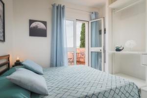 Ένα ή περισσότερα κρεβάτια σε δωμάτιο στο VILLA IRENE +185 φωτογραφίες