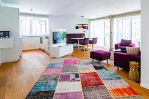 A television and/or entertainment centre at baadhaus - 4 Sterne Superior