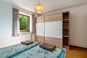 Rúm í herbergi á Gatscherhof Apt Abendrot