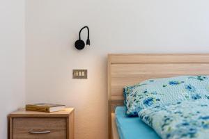 Rúm í herbergi á Gatscherhof Apt Abendrot