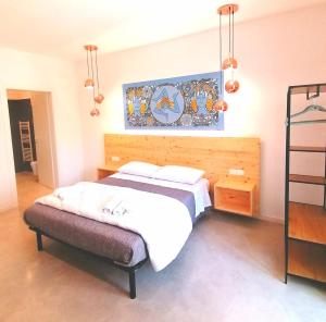 Postel nebo postele na pokoji v ubytování B&B Ibla Art Centro