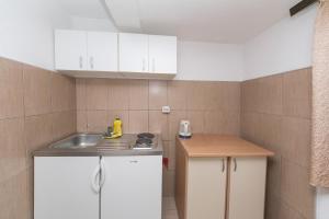 Kuchyň nebo kuchyňský kout v ubytování Apartments by the sea Podaca, Makarska - 4734