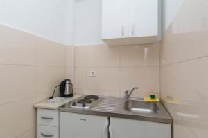 Kuchyň nebo kuchyňský kout v ubytování Apartments by the sea Podaca, Makarska - 4734