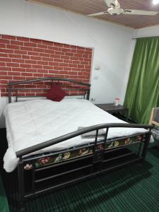 Letto o letti in una camera di Hotel New Heaven Canal