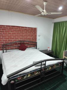 Letto o letti in una camera di Hotel New Heaven Canal