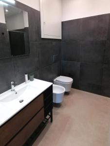 Koupelna v ubytování B&B Ibla Art Centro