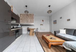 Cuisine ou kitchenette dans l'établissement Résidence Nature - Appartements design en centre ville