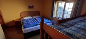 Letto o letti in una camera di Fáilte Lodging Kenmare Town Centre