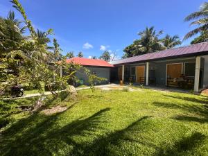 Zahrada ubytování Cris & Mar Homestay