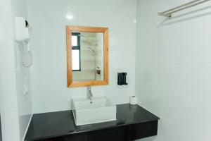 Vannituba majutusasutuses AIMI Beach Hotel