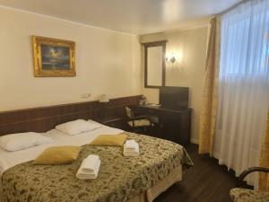 Krevet ili kreveti u jedinici u okviru objekta Taanilinna Hotell