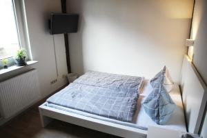 Postel nebo postele na pokoji v ubytování Hotel Zur Krone