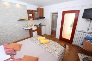 TV a/nebo společenská místnost v ubytování Apartments Frane