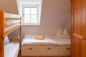 Postel nebo postele na pokoji v ubytování Waldhof-Iphofen