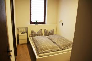 Postel nebo postele na pokoji v ubytování Hotel Zur Krone
