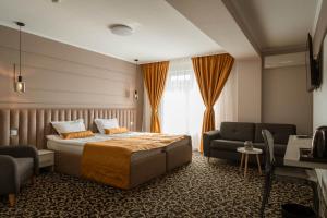 Säng eller sängar i ett rum på ALLEGRIA HOTEL Spa