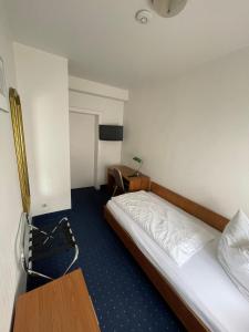 Postel nebo postele na pokoji v ubytování Hotel Horstmann Münster + 5 fotografií