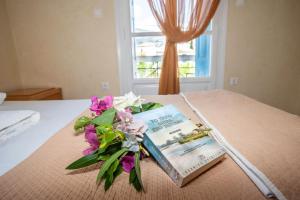Postel nebo postele na pokoji v ubytování Hotel Argo