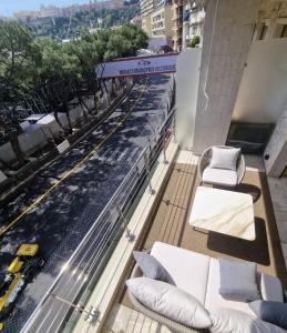a balcony with a view of a train on the tracks at xGP Track Flat, Up to 14 Guests in Monte Carlo