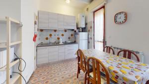 A kitchen or kitchenette at Vela Latina - By Ligooria